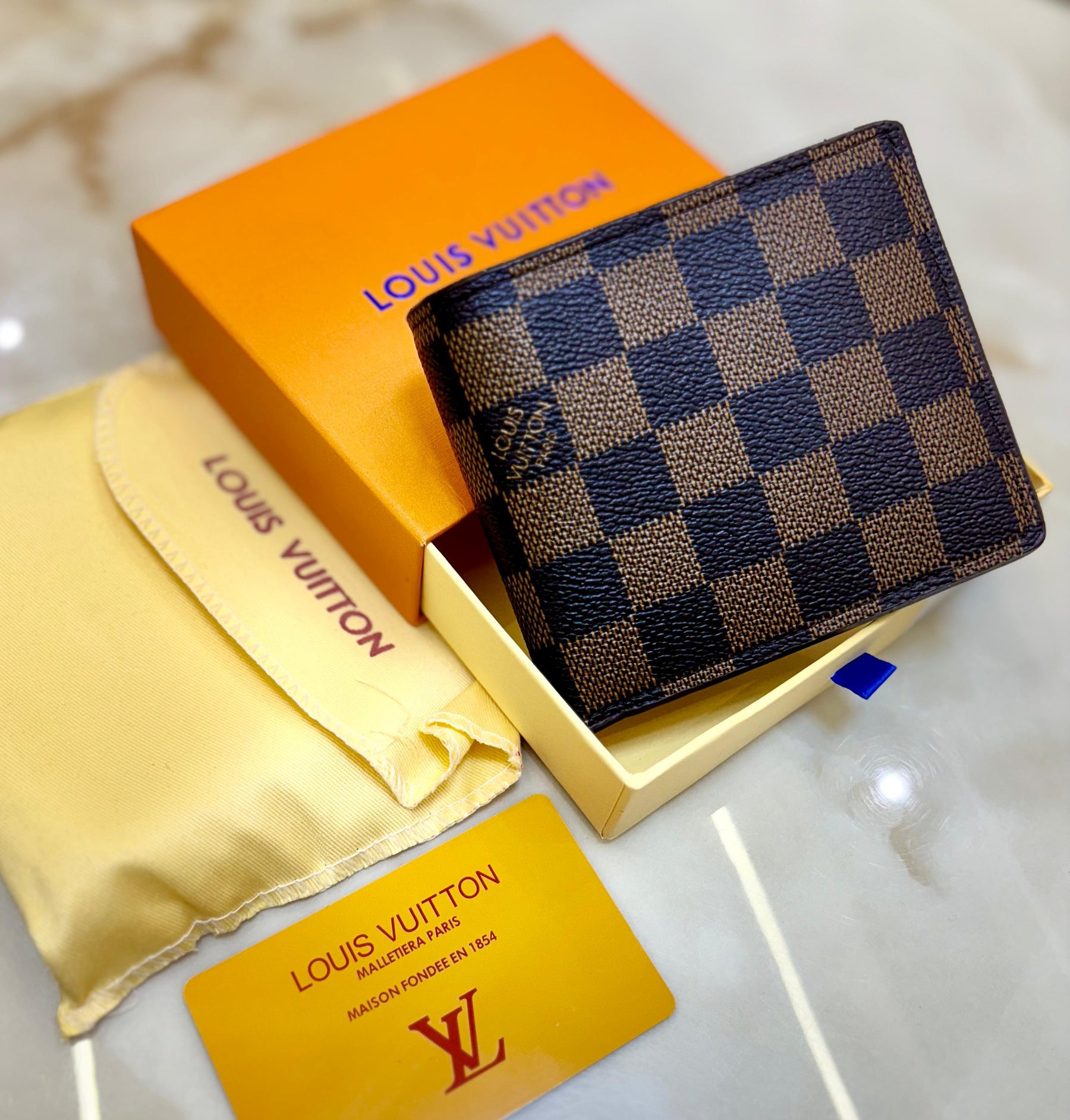 Luxe Essentials: LV Wallets